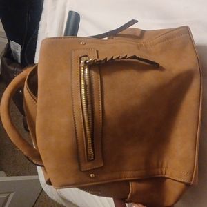Small faux leather bookbag